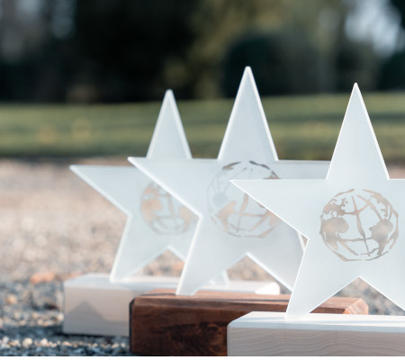 Drei Climate Star Pokale aus Glassternen